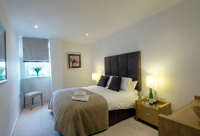 two bed serviced apartments bedroom